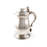 A George III silver tankard, by John King, London 1777, baluster form, central girdle, scroll