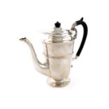 An Edwardian silver coffee pot, by William Hutton & Sons Ltd, London 1904, tapering circular form,