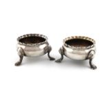 A pair of George III Scottish provincial silver salt cellars, marked with a unicorn, a thistle and