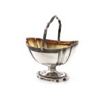 A George III silver swing-handled sugar basket, by John Edwards, London 1794, rounded rectangular