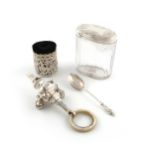 A mixed lot of silver items, comprising: an Edwardian silver baby's rattle, by Goldsmiths &