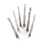 A collection of George III silver sugar tongs by the Bateman family, comprising: two pairs by
