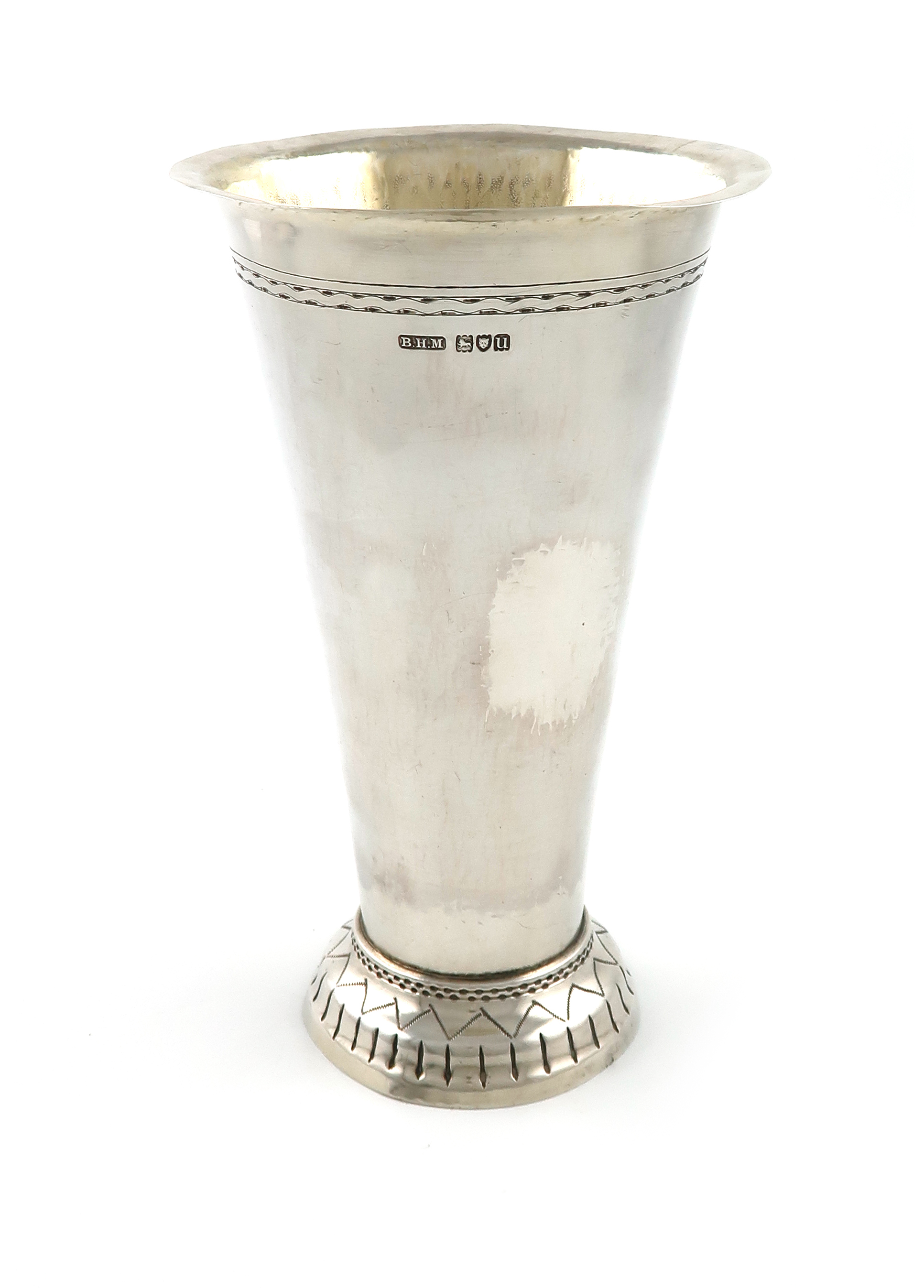 A silver gambling beaker, by Berthold Muller, London 1915, tapering circular form, engraved borders,