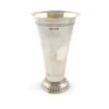 A silver gambling beaker, by Berthold Muller, London 1915, tapering circular form, engraved borders,