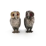 A pair of Victorian novelty silver owl pepper pots, by George Richards, London 1851, modelled in