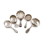 A small collection of five antique silver caddy spoons, various dates and makers, comprising: one by