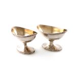 A pair of George III silver salt cellars, by John Emes, London 1800/01, oval form, reeded borders,