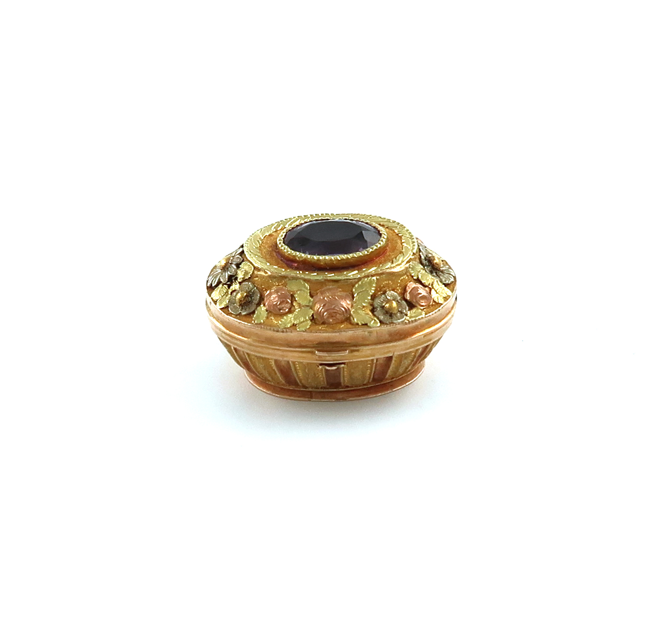 A 19th century French gold vinaigrette, marked with a French control mark, oval form, part-fluted