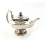 λA George IV Scottish silver teapot, by Robert Gray & Son, Glasgow 1825, circular form, scroll