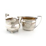 A George III silver cream jug, by John Emes, London 1803, oval from, reeded border and scroll