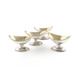 A set of four George III silver salt cellars, by Robert Hennell, London 1794, oval form, gilded