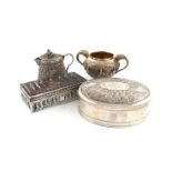 A mixed lot of silver and metalware items, comprising: an Indian covered jug, of tapering oval form,