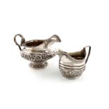 A George IV silver cream jug, by William Eley, London 1824, compressed circular form, foliate