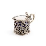 A Victorian silver mustard pot, by Robert Garrard, London 1842, circular form, pierced foliate