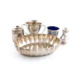 A mixed lot of silver items, comprising: an Edwardian silver fluted dish, by Heath and Middleton,