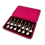 A set of twelve Edwardian silver Apostle teaspoons with the Master teaspoon, by T. Bradbury and Son,