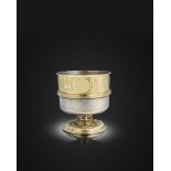 A late 16th century German parcel-gilt silver setzbecher or stacking beaker, no apparent town or