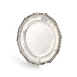 A Victorian silver plate, by Robert Garrard, London 1875, circular form, gadroon border, engraved