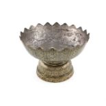 A 19th century Thai silver and silver-gilt and niello work tazza, unmarked, circular form, finely