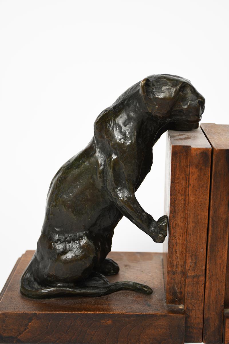Roger Godchaux (1878-1958) Panthers a pair of patinated bronze book ends, wooden bases applied - Image 2 of 3