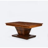 An Art Deco burr walnut extending pedestal dining table and six mahogany dining chairs, the