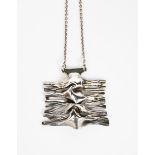 A silver pendant necklace by MJM, square form cast in relief, stamped marks MJM, 5cm. long