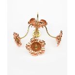A large and impressive copper and brass wall light in the manner of WAS Benson, three scrolling