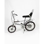 A Raleigh Chopper Mk-2 SE bicycle, three speed gears, silver with cast alloy mag wheels, applied