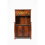 An oak cabinet designed by Edgar Wood, rectangular with two hinged door cupboards, under a hinged