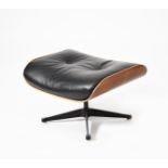 A modern Ottoman footstool after a design by Charles and Ray Eames, teak laminate with black