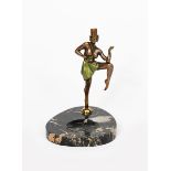 A painted metal figure of a dancer in a top hat, on shaped veined marble base, unsigned, 23cm. high