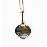 A Finnish sliver pendant necklace, heart-shaped strap frame set with central hardstone cabochon,