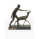 Henri Fugere (1872-1944) Woman with a Deer patinated bronze, on veined marble base signed in the