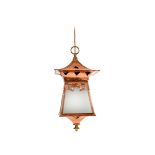 A copper and brass hall lantern, flaring square section with tapering base, the flaring overmantel