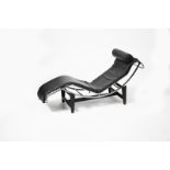 A modern chrome metal LC4 chaise lounge after a design by Le Courbusier, enamelled black base