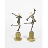 λ Josef Lorenzl (1892-1950) Dancers a pair of patinated bronze and ivory figures, on different green