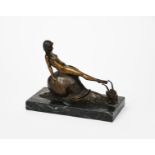 A patinated bronze model of naked woman riding a snail, in the manner of Bruno Zach, on veined