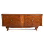 An Art Deco rosewood sideboard in the manner of Andre Arbus, rectangular section, on four flaring