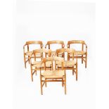 A set of six PP Mobler oak chairs designed by Hans Wegner, model PP62, with paper cord seats,