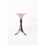 A patinated copper and brass table lamp in the manner of the Birmingham Guild of Handicraft,