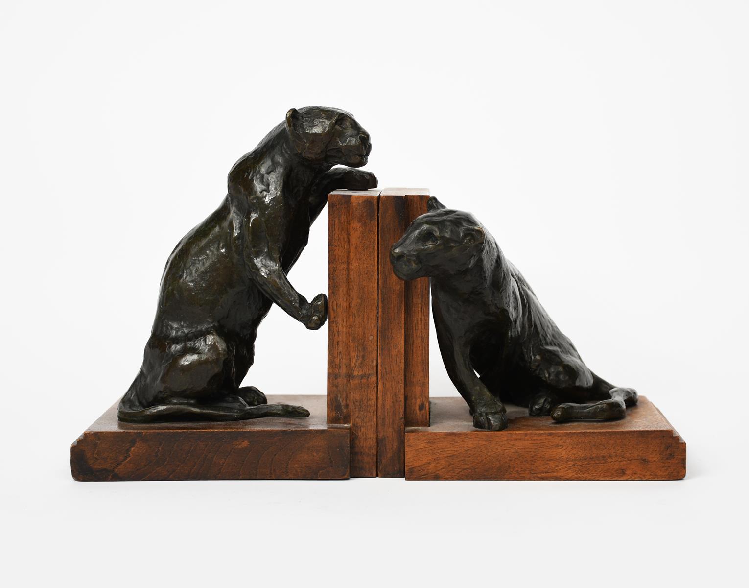 Roger Godchaux (1878-1958) Panthers a pair of patinated bronze book ends, wooden bases applied - Image 3 of 3