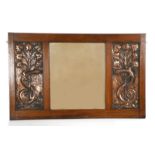 A large and impressive John Pearson oak and repousse copper wall mirror, rectangular, oak frame with