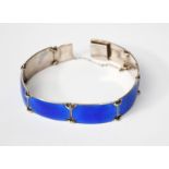 A Norwegian Finn Jensen silver and enamel bracelet, seven rectangular panels, enamelled blue,