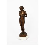 Szigfrid Pomgracz (1872-1929) Girl with an Apple, patinated metal of a young girl, standing,