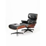 A modern lounger and Ottoman after a design by Charles & Ray Eames, macassar veneer with black