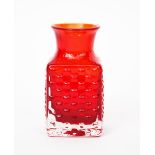 A Whitefriars Ruby red glass vase designed by Geoffrey Baxter, shouldered square section, textured