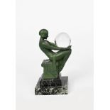 Max Le Verrier (1891-1973) a verdi gris patinated sculptural lamp, modelled as a woman seated on a