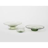 A James Powell & Sons Whitefriars green glass finger bowl designed by T G Jackson, swollen form, and