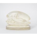 A marble sculpture of Venus Arising, Venus and a cherub modelled resting in a large shell, on oval