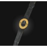 Longines, a lady's gold wristwatch, the oval dial of textured black enamel, with baton indicators at